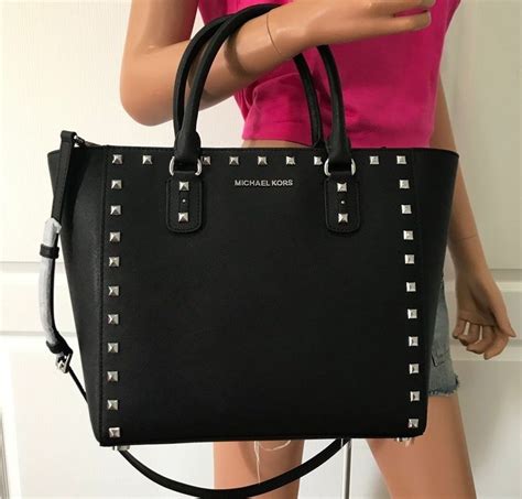 black michael kors with silver hardware|Women's Silver Designer Handbags .